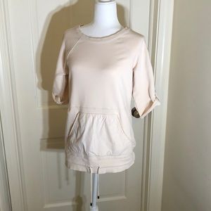 A/X Light pink short sleeve sweatshirt.